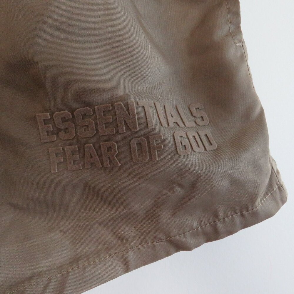 ESSENTIALS FEAR OF GOD Straight Leg Logo Appliquéd Shell Drawstring Shorts Khaki - Picture 3 of 16